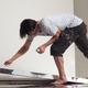 Carrey at work in his studio in 2010. (Photo: Philip Ramey Photography, LLC / Getty Images)